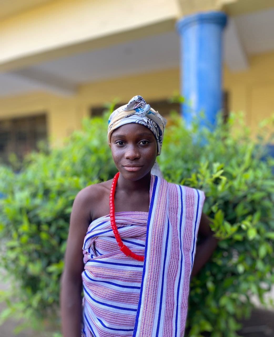 Learner in cultural attire at Treasureland Academy